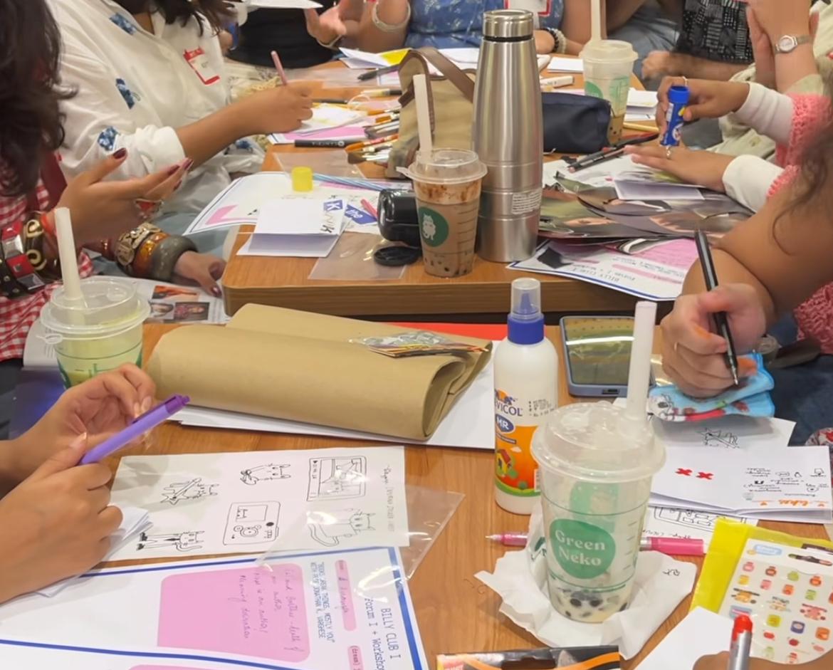 Guests creating zines together at Green Neko